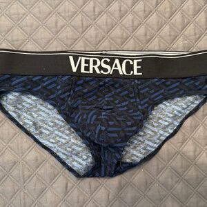 New men’s blue pattern Versace briefs. Size large.